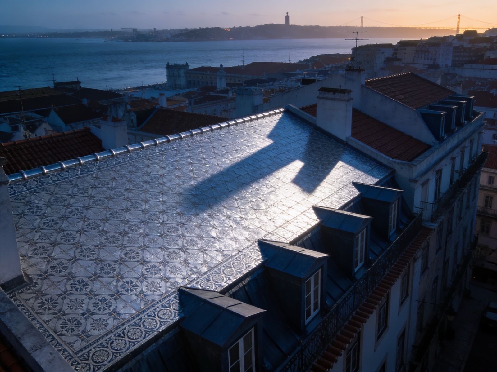 A stadium roof above the city